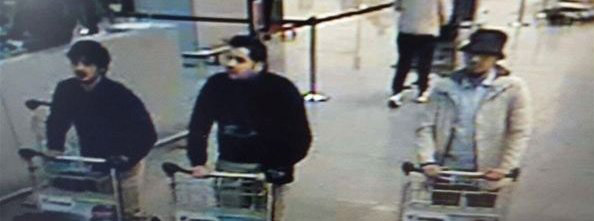 TOPSHOT - A picture released on March 22, 2016 by the belgian federal police on demand of the Federal prosecutor shows a screengrab of the airport CCTV camera showing suspects of this morning's attacks at Brussels Airport, in Zaventem.  Two explosions in the departure hall of Brussels Airport this morning took the lives of 14 people, 81 got injured. Government sources speak of a terrorist attack. The terrorist threat level has been heightened to four across the country. / AFP PHOTO / BELGIAN FEDERAL POLICE / - / RESTRICTED TO EDITORIAL USE - MANDATORY CREDIT "AFP PHOTO / BELGIAN FEDERAL POLICE" - NO MARKETING NO ADVERTISING CAMPAIGNS - DISTRIBUTED AS A SERVICE TO CLIENTS